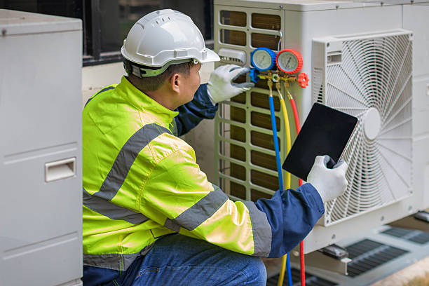 Professional Hvac technician working in Española, NM